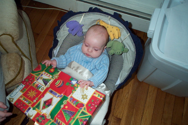 Jackson opens his first Christmas present
