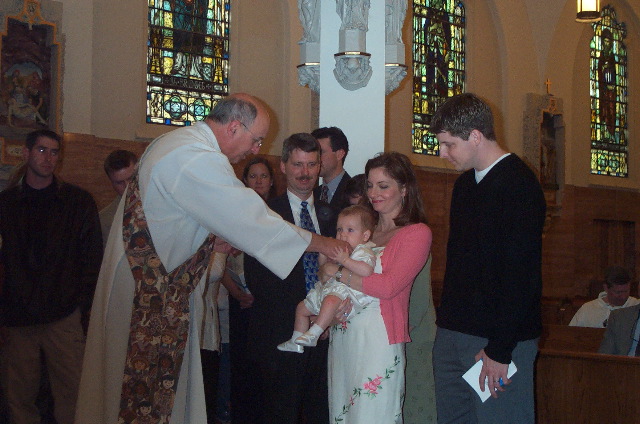 Grabbing the priest's hands