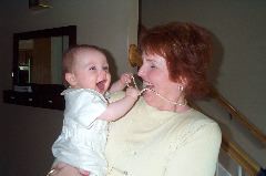 Playing with Nana's pearls