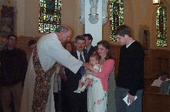 Grabbing the priest's hands